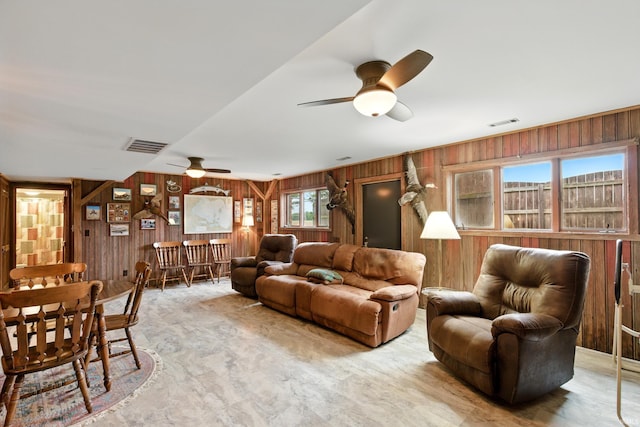 2090 S Warren Rd, Huntington, IN 46750 - living room with wooden walls and a ceiling fan