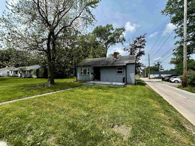 4314 Smith St, Fort Wayne, IN 46806 - view of front of property featuring a front yard and a chimney