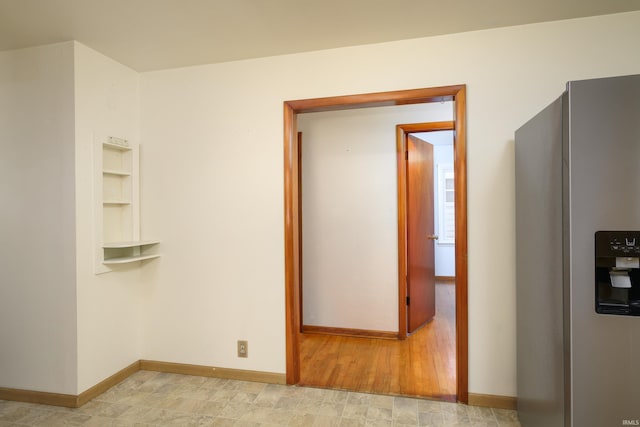 922 N Broadway St, Seymour, IN 47274 - empty room with baseboards and built in shelves
