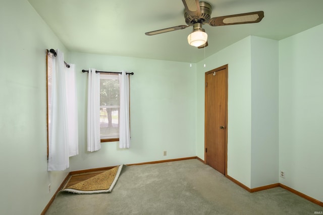 922 N Broadway St, Seymour, IN 47274 - spare room featuring ceiling fan, carpet floors, and baseboards