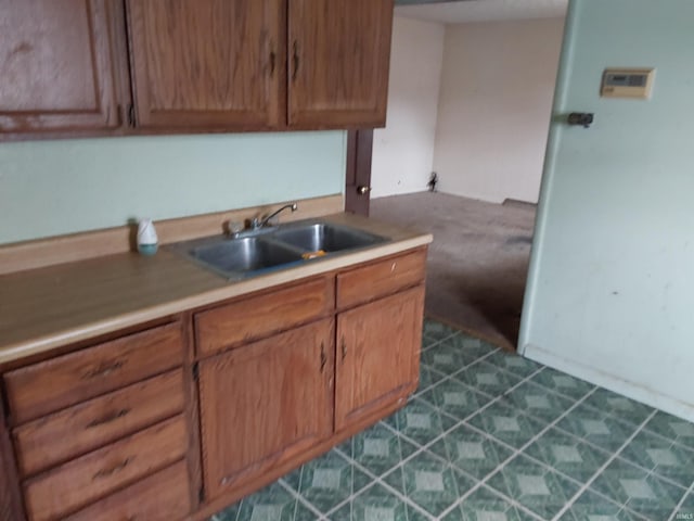 1006 W Rose St, South Bend, IN 46616 - kitchen with a sink and brown cabinets