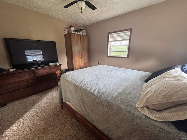 14512 Old State Road 37, Tell City, IN 47586 - bedroom featuring carpet floors, a textured ceiling, and a ceiling fan