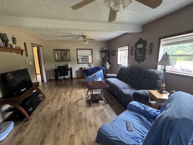 14512 Old State Road 37, Tell City, IN 47586 - living room featuring a ceiling fan, a textured ceiling, light wood-style floors, a desk, and beam ceiling