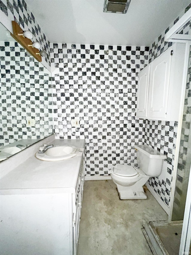 402 W Elm St, Gaston, IN 47342 - bathroom featuring toilet, vanity, and tile patterned floors