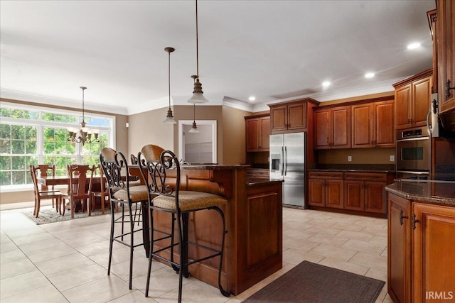 6444 Pebble Pointe Ct, Newburgh, IN 47630 - kitchen with stainless steel refrigerator with ice dispenser, ornamental molding, a kitchen breakfast bar, recessed lighting, and decorative light fixtures