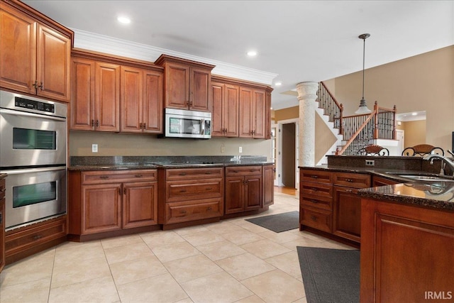 6444 Pebble Pointe Ct, Newburgh, IN 47630 - kitchen with appliances with stainless steel finishes, a sink, hanging light fixtures, ornamental molding, and brown cabinets