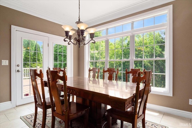 6444 Pebble Pointe Ct, Newburgh, IN 47630 - dining area featuring light tile patterned flooring, a chandelier, baseboards, and crown molding