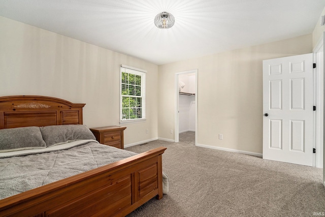 58201 Windsong Dr, Elkhart, IN 46517 - bedroom featuring carpet flooring, baseboards, and a spacious closet