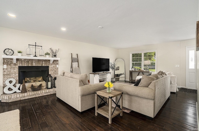 58201 Windsong Dr, Elkhart, IN 46517 - living area featuring dark wood-type flooring, a fireplace, and recessed lighting