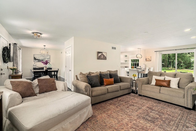 58201 Windsong Dr, Elkhart, IN 46517 - living room featuring a chandelier and recessed lighting