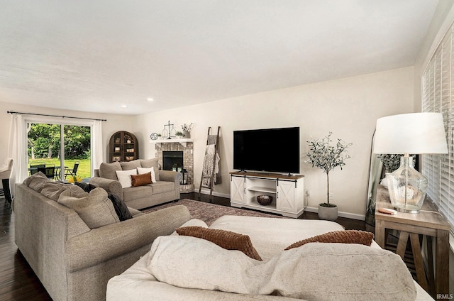 58201 Windsong Dr, Elkhart, IN 46517 - living room featuring dark wood-style floors, baseboards, and a fireplace