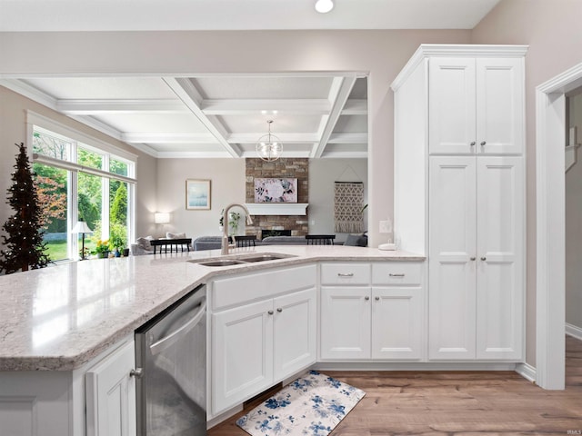 10805 Eagle River Run, Fort Wayne, IN 46845 - kitchen with dishwasher, a sink, open floor plan, coffered ceiling, and a stone fireplace