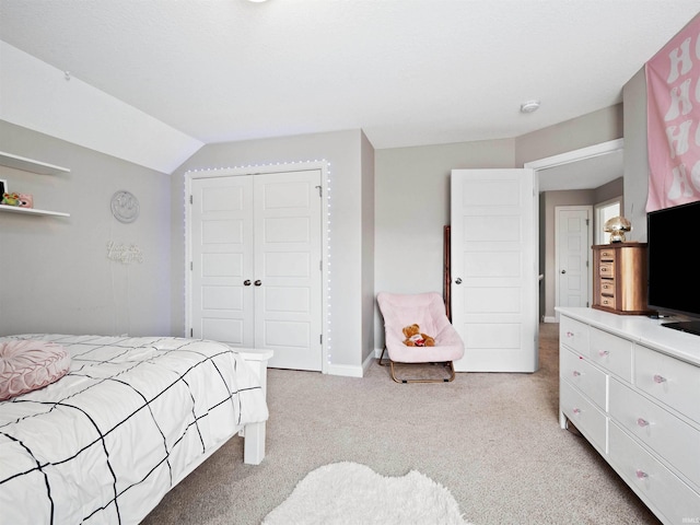 10805 Eagle River Run, Fort Wayne, IN 46845 - bedroom with light carpet, a closet, vaulted ceiling, and baseboards