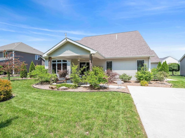10805 Eagle River Run, Fort Wayne, IN 46845 - ranch-style home featuring a front yard, a patio, a ceiling fan, and roof with shingles