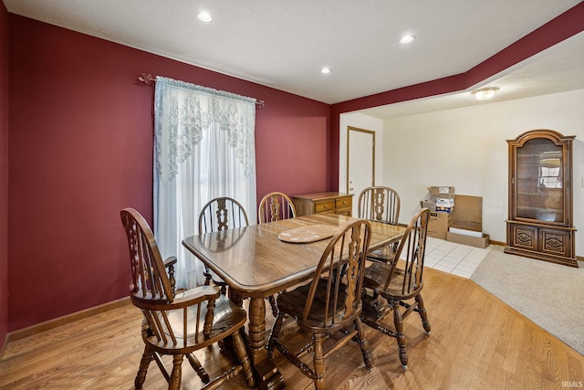 61587 Brompton Rd, South Bend, IN 46614 - dining room with recessed lighting, baseboards, and light wood-style floors