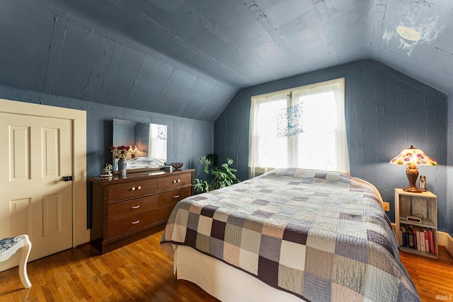 1712 High St, Fort Wayne, IN 46808 - bedroom featuring wood finished floors and lofted ceiling