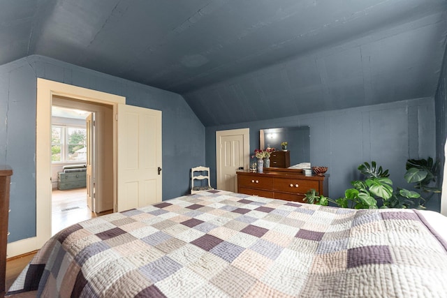 1712 High St, Fort Wayne, IN 46808 - bedroom featuring vaulted ceiling and wood finished floors