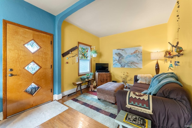 1712 High St, Fort Wayne, IN 46808 - foyer entrance with wood finished floors and baseboards