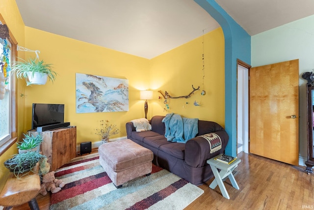 1712 High St, Fort Wayne, IN 46808 - living room with wood finished floors and arched walkways