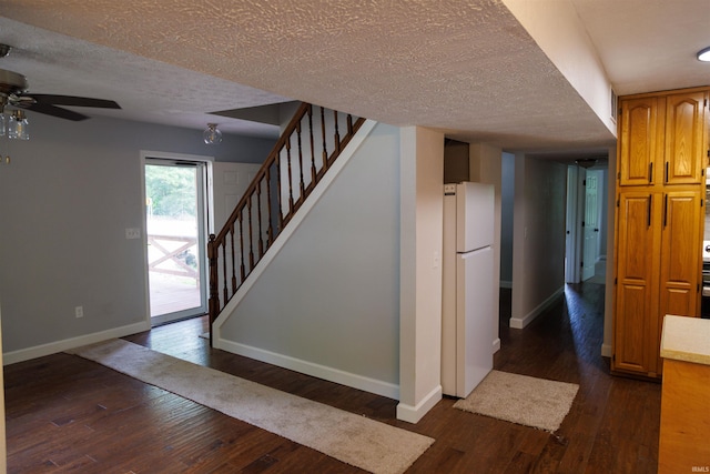 3289 S State Road 37th Rd, Paoli, IN 47454 - staircase featuring baseboards, a textured ceiling, wood finished floors, and ceiling fan