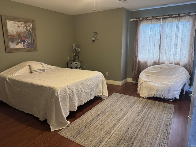 5533 N 150 Rd E, Urbana, IN 46990 - bedroom with dark wood-style floors and baseboards