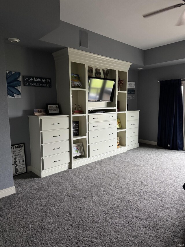 5533 N 150 Rd E, Urbana, IN 46990 - unfurnished bedroom featuring carpet floors, baseboards, and a ceiling fan