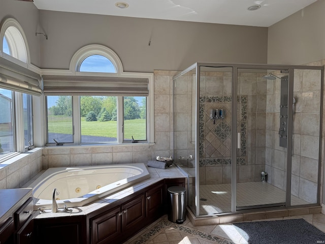 5533 N 150 Rd E, Urbana, IN 46990 - full bath with a whirlpool tub, a shower stall, and tile patterned floors