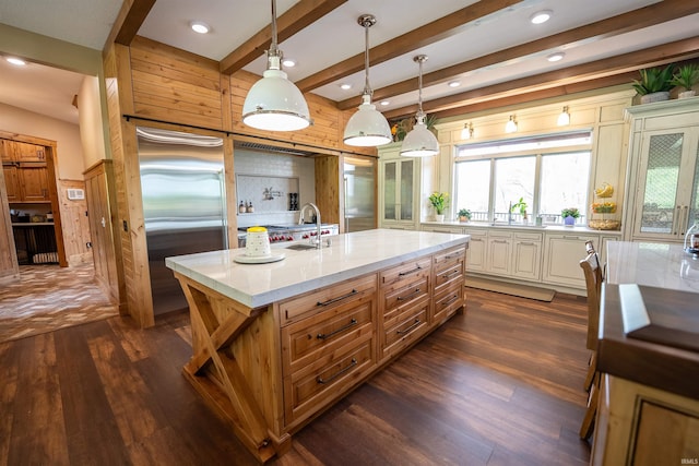 8615 W 450 S, Hudson, IN 46747 - kitchen featuring dark wood finished floors, built in fridge, a sink, light stone counters, and recessed lighting