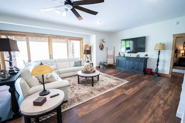 8615 W 450 S, Hudson, IN 46747 - living room with ceiling fan, dark wood-style flooring, and baseboards