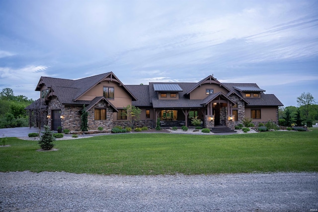 8615 W 450 S, Hudson, IN 46747 - craftsman-style house featuring stone siding and a front lawn