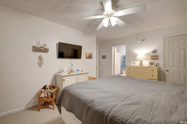 2881 S Walnut St Pike, Bloomington, IN 47401 - bedroom featuring a textured ceiling, light colored carpet, a ceiling fan, and baseboards