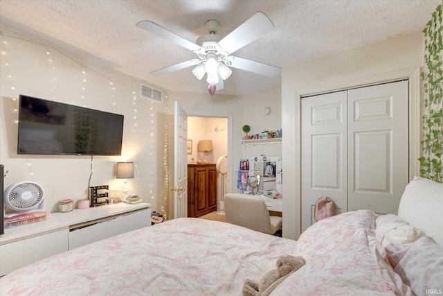 2881 S Walnut St Pike, Bloomington, IN 47401 - bedroom featuring a textured ceiling, a closet, and ceiling fan