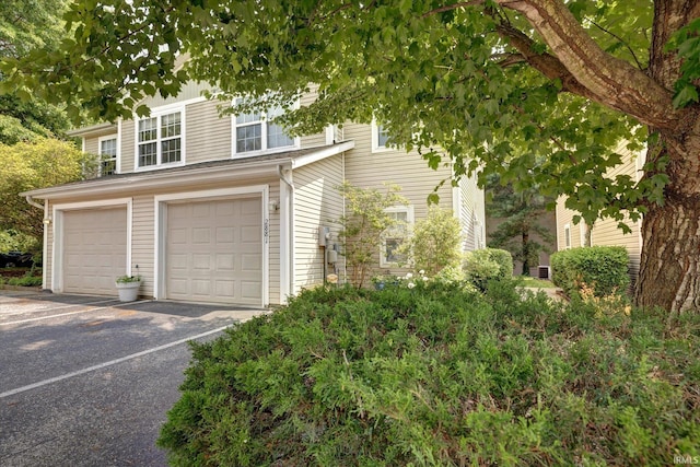 2881 S Walnut St Pike, Bloomington, IN 47401 - view of front of property featuring a garage and driveway