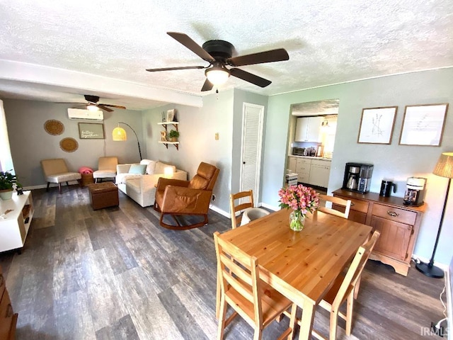 138 N Harrison St, Bloomfield, IN 47424 - dining area featuring a ceiling fan, a textured ceiling, dark wood-style floors, an AC wall unit, and baseboards