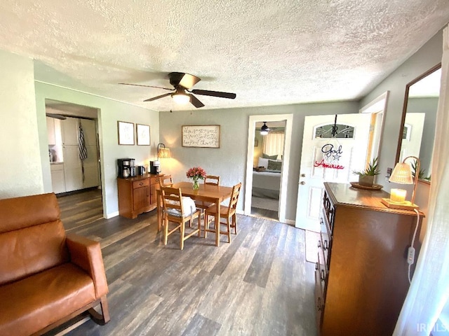 138 N Harrison St, Bloomfield, IN 47424 - dining space with ceiling fan, dark wood finished floors, a textured ceiling, and baseboards