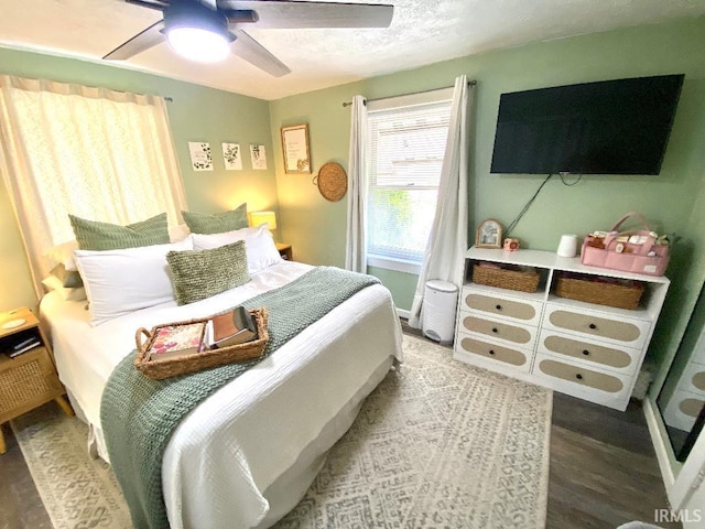 138 N Harrison St, Bloomfield, IN 47424 - bedroom with wood finished floors and a ceiling fan