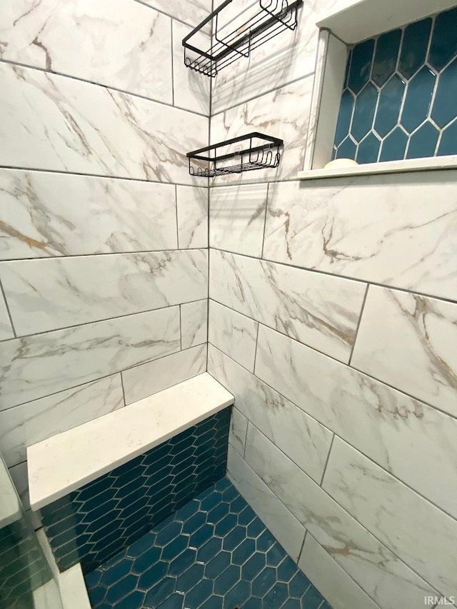 138 N Harrison St, Bloomfield, IN 47424 - bathroom featuring a tile shower and tile patterned flooring