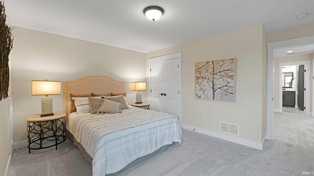 5272 Greyson Heights Dr, Auburn, IN 46706 - bedroom with light carpet, baseboards, and a closet