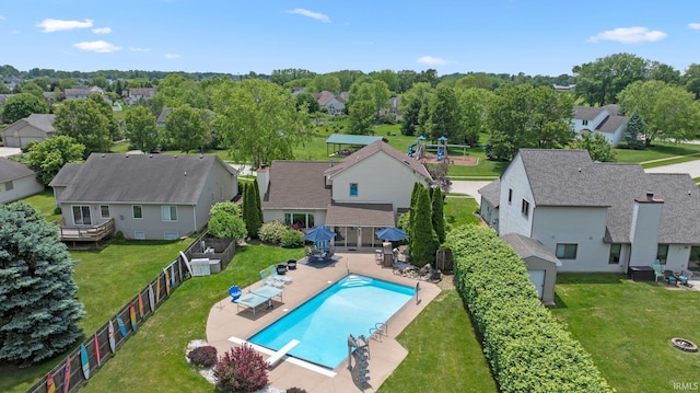16316 Thunderbird Rd, Huntertown, IN 46748 - view of swimming pool with a residential view, a diving board, and a patio