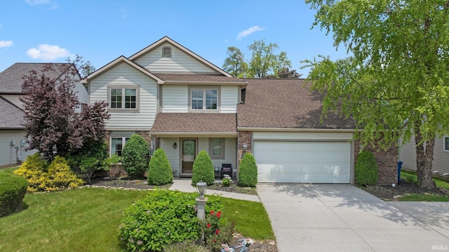 16316 Thunderbird Rd, Huntertown, IN 46748 - view of front facade with a garage, driveway, a front yard, a shingled roof, and brick siding
