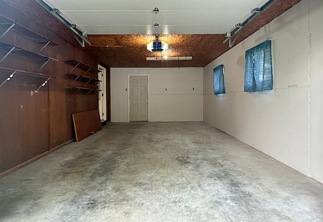209 Acton St, Loogootee, IN 47553 - garage featuring a garage door opener