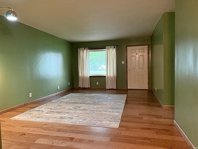 209 Acton St, Loogootee, IN 47553 - spare room with light wood-style floors and baseboards