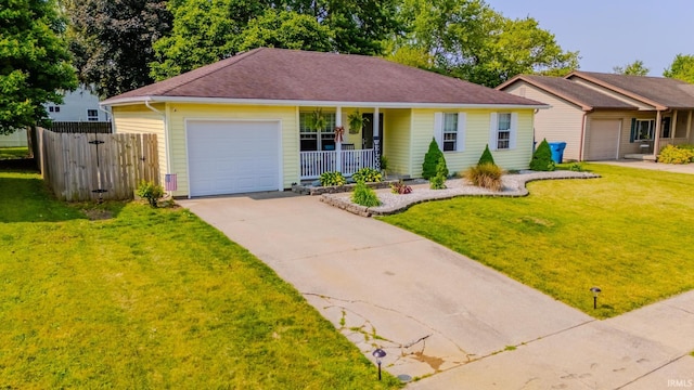 36 Jacks St, Gas City, IN 46933 - ranch-style house with an attached garage, covered porch, and driveway
