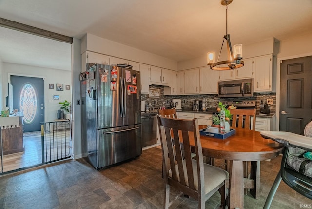 36 Jacks St, Gas City, IN 46933 - dining room featuring a chandelier
