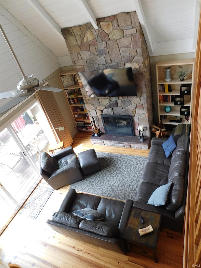 9381 E Promontory Point Dr, Syracuse, IN 46567 - living area featuring wood finished floors and a fireplace