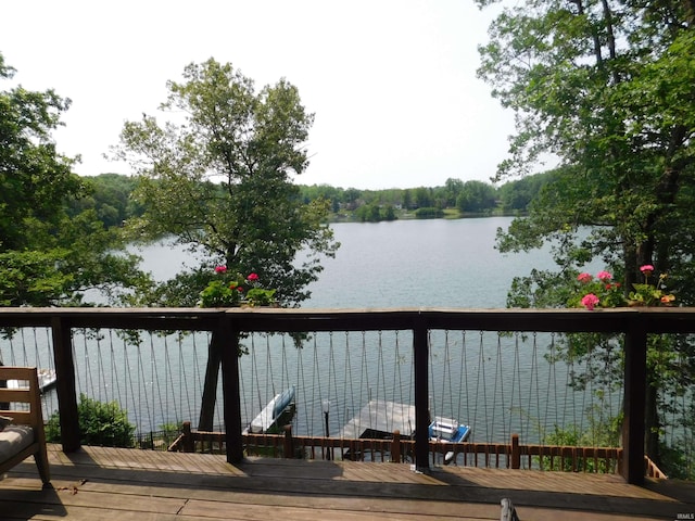 9381 E Promontory Point Dr, Syracuse, IN 46567 - wooden terrace with a water view