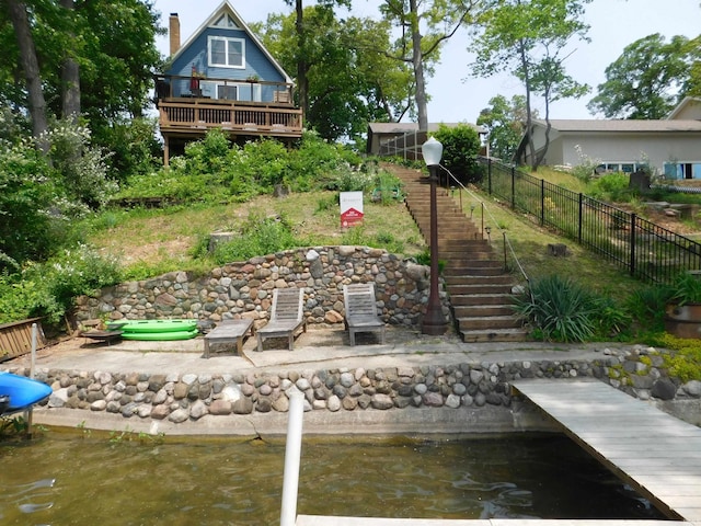 9381 E Promontory Point Dr, Syracuse, IN 46567 - dock area featuring stairway and a water view