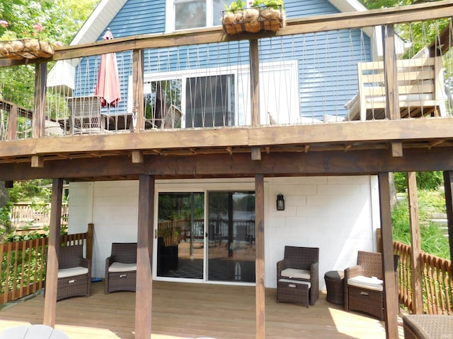 9381 E Promontory Point Dr, Syracuse, IN 46567 - rear view of property featuring a deck
