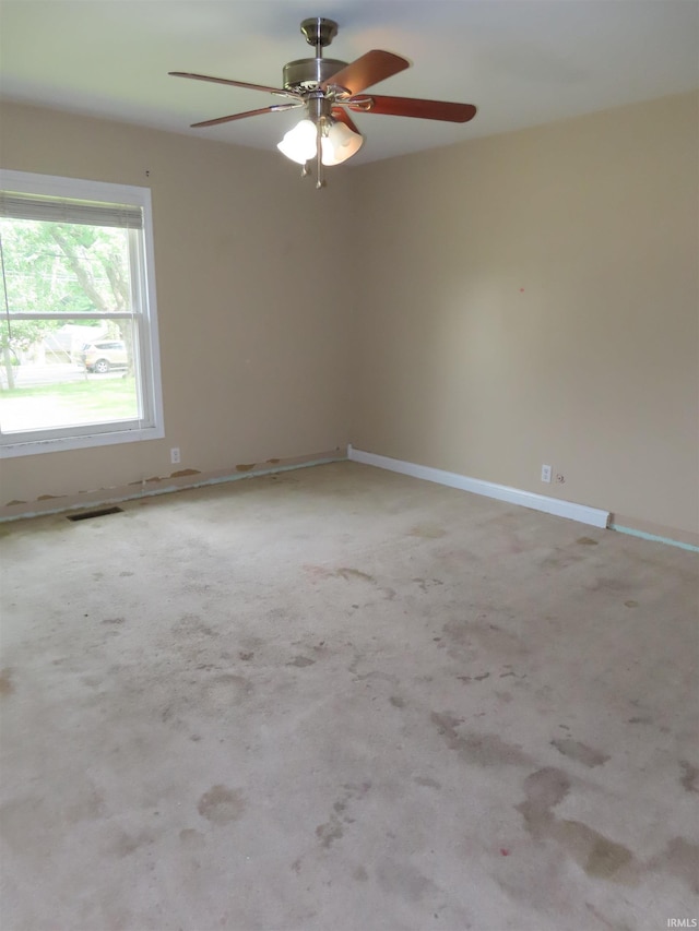 3910 Stringtown Rd, Evansville, IN 47711 - unfurnished room featuring ceiling fan, carpet flooring, and baseboards