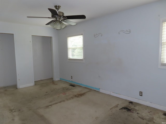 3910 Stringtown Rd, Evansville, IN 47711 - unfurnished bedroom featuring a ceiling fan and baseboards